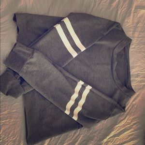 Grey long sleeve with white design.